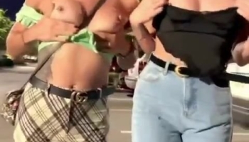 Gorgeous titties flash in the parking lot