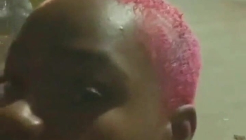 Hottie with short pink hair goes down and gives a public blowjob to a BBC
