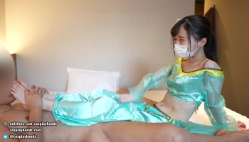 Japanese girl dressed as Arabian gives a guy a footjob until he manages to cum