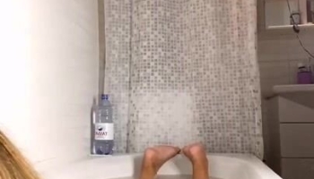 Sexy russian young in bath tube teasing her juicy ass