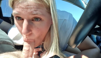 The man is drivng the car while she is sucking his dick until she cums