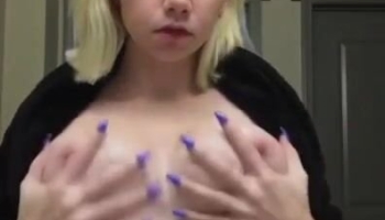 Gorgeous 19 year old teasing her huge natural nipples