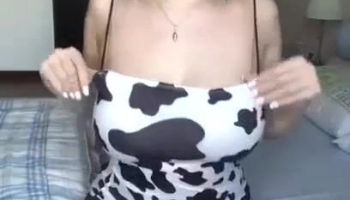 Gorgeous busty asian girl unpacks her big milkers