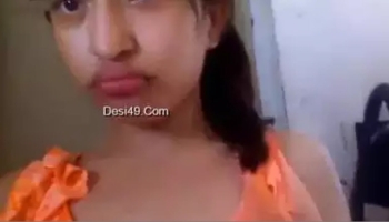 INDIAN BABE IN ORANGE TAKES CLOTHES OFF TO FLAUNT BOOBS AND BUTTOCKS