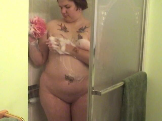 Tattooed fat chick strips to wash her tits and cunt in the shower –  – Solo Sensations