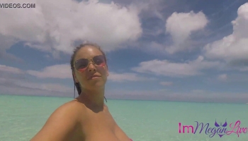 ImMeganlive’s underwater tease: Big tits in a bikini and a close-up of her pussy in the pool